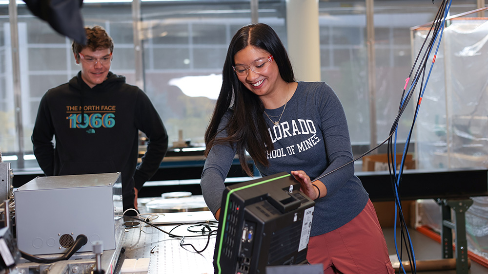 Graduate students working in a Mines computer lab