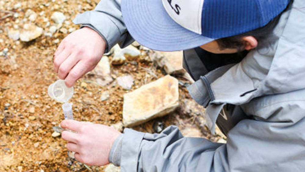 civil engineer working in the field close to the ground