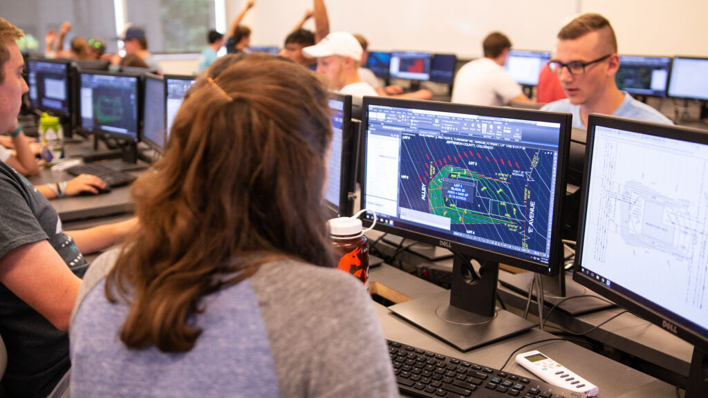 Students working in a civil-engineering field session in the computer lab.
