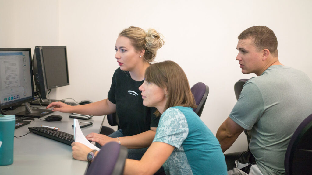 Students working on a project on the computer