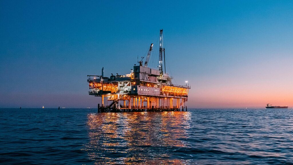 Petroleum rig out on the ocean at night