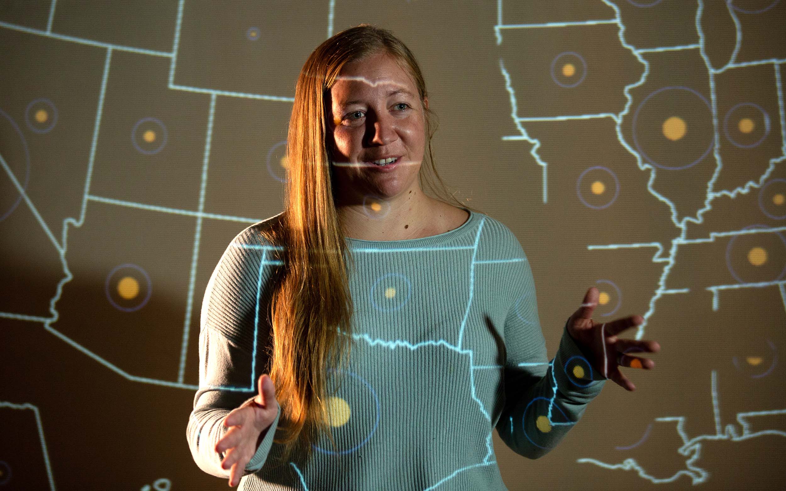 Core Principles of Accessibility Colorado School of Mines student working with a digital map of the United States