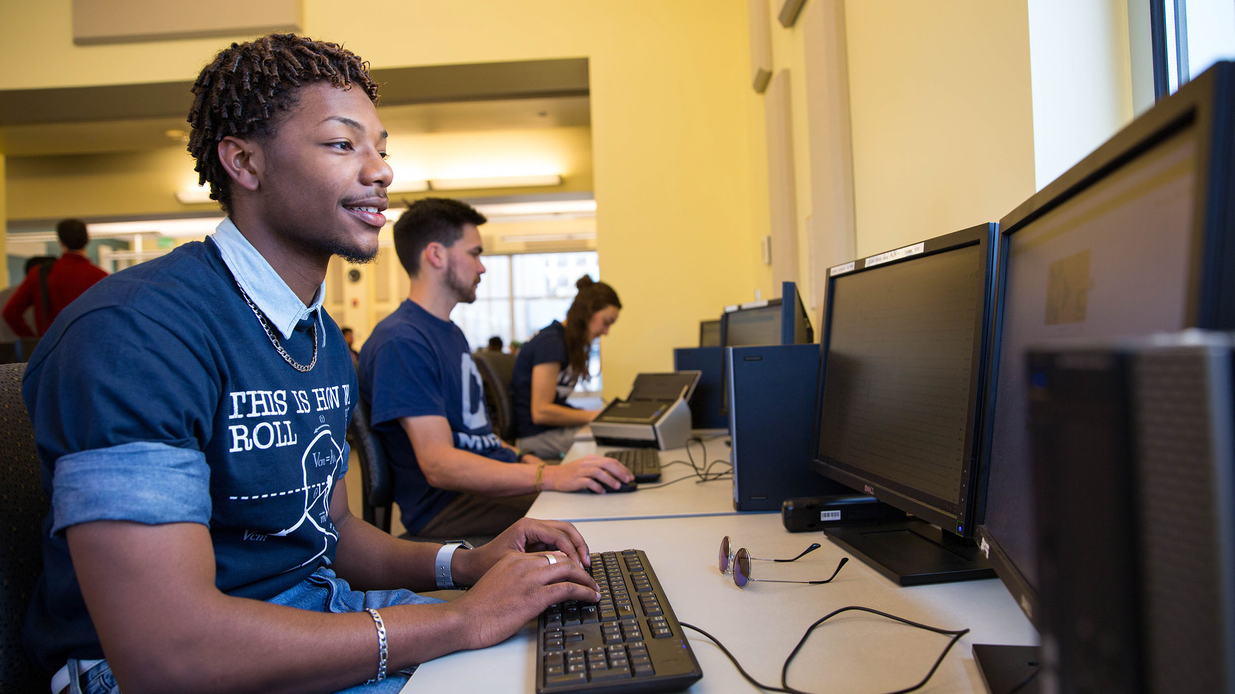 Student working on a website in the computer lab