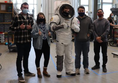 Lunar Dust Mitigation: EVA Suit Coverings
