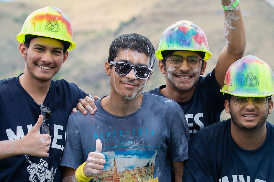 four guys on M-Climb, posing and smiling