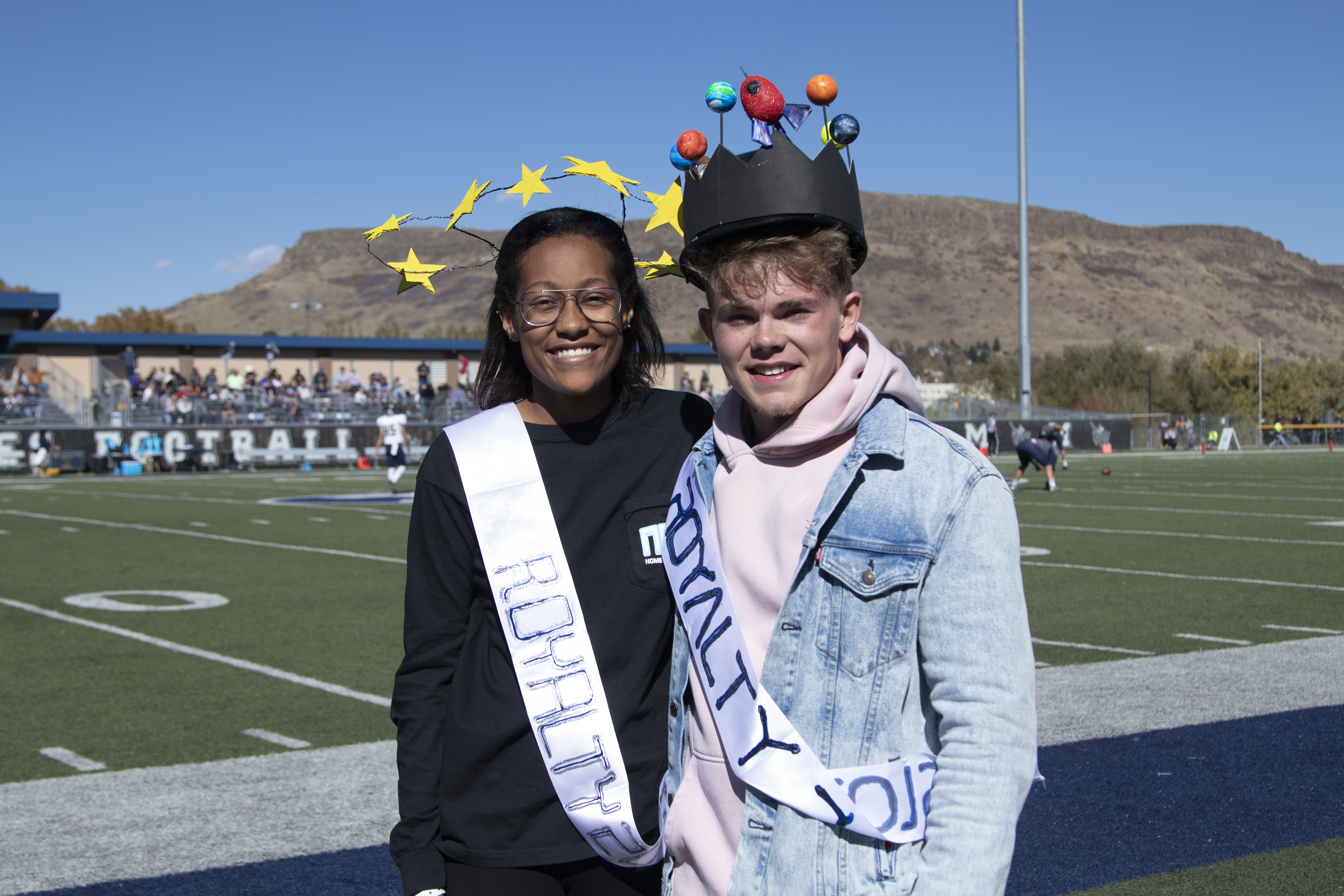 homecoming queen and king at Marv Kay stadium