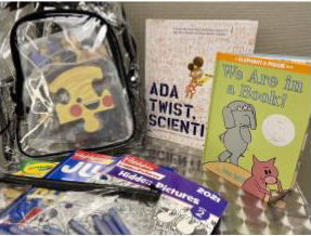 Display of busy bags including backpack and activity books
