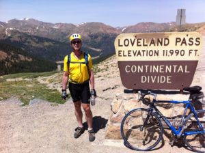 Reuben Collins with bike at Loveland Pass