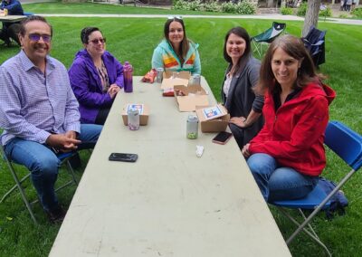 Members seated at a long table