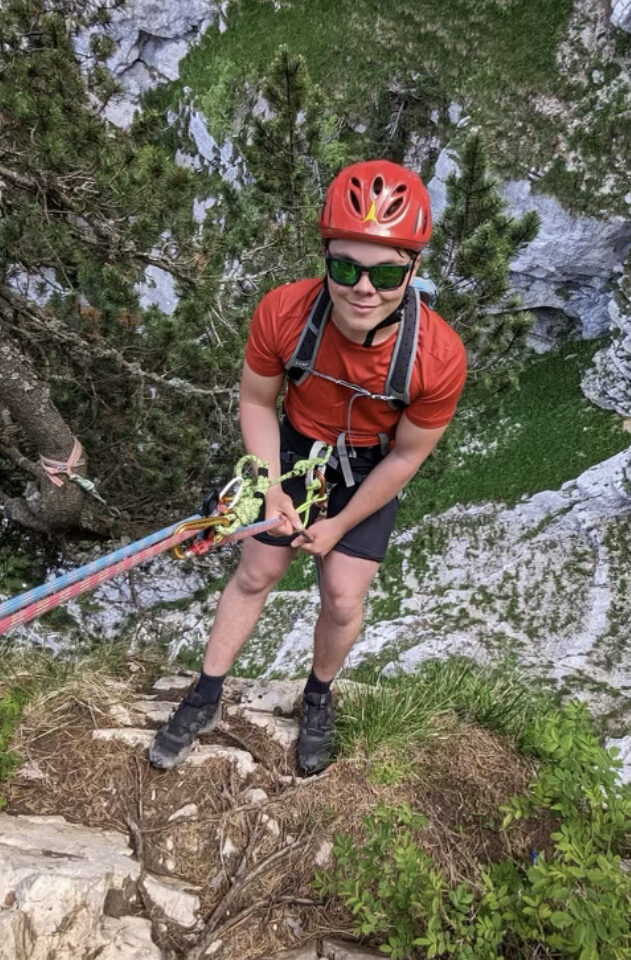 Student rock climbing