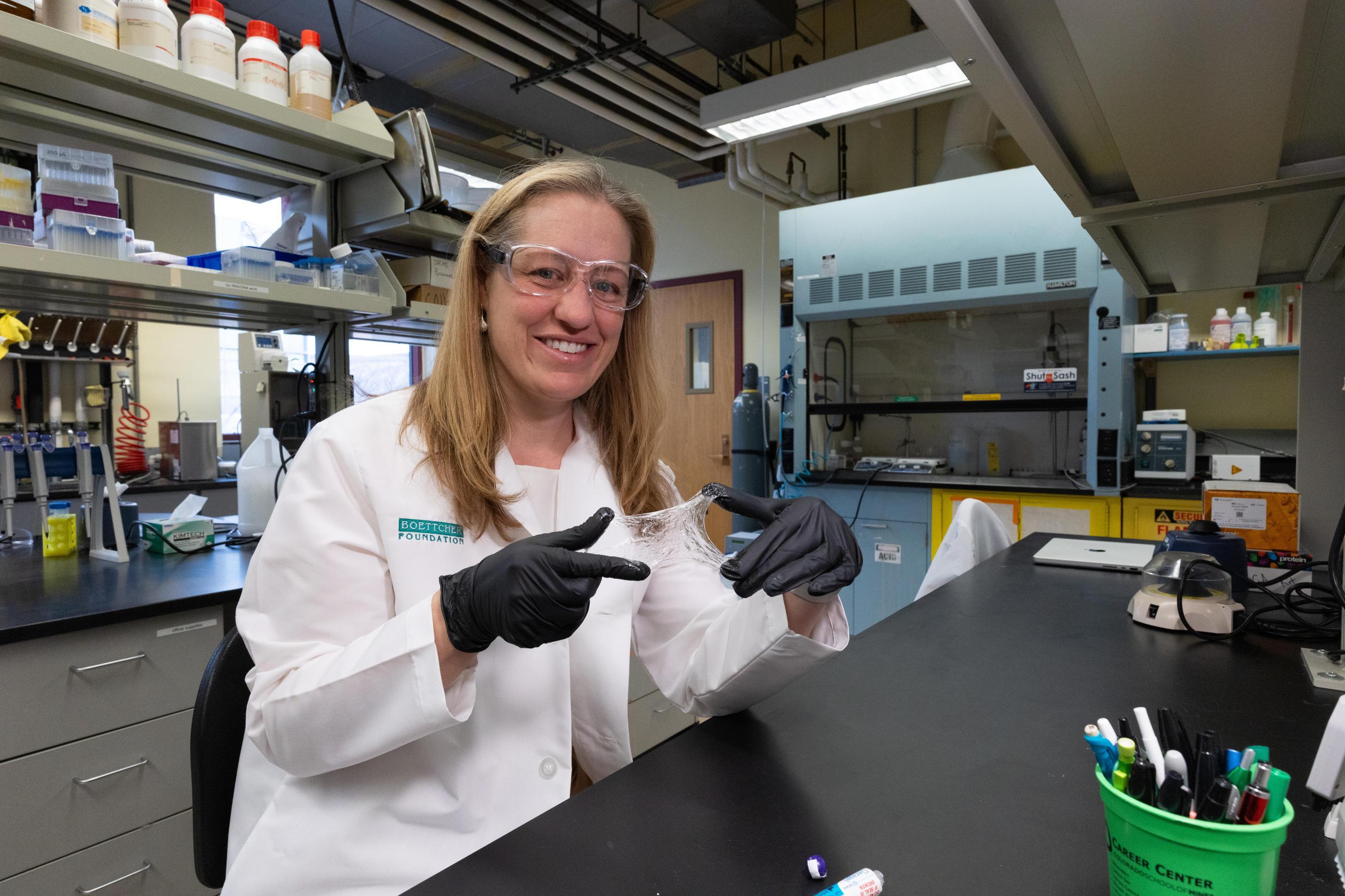 Melissa Krebs holds a sample of CleraFlex in her lab