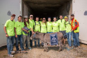 Students with Blaster the Burro at Edgar Mine entrance.