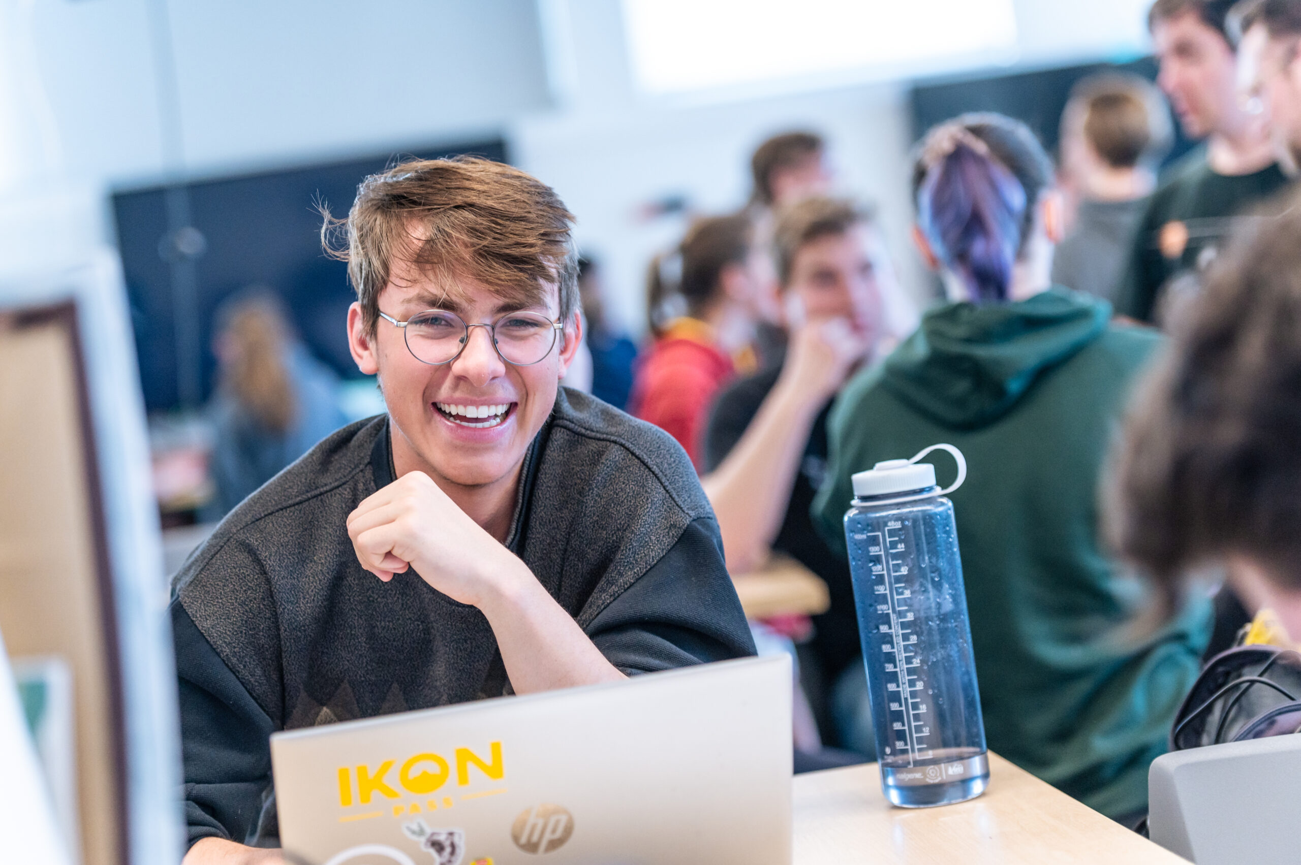 Student smiling while in class