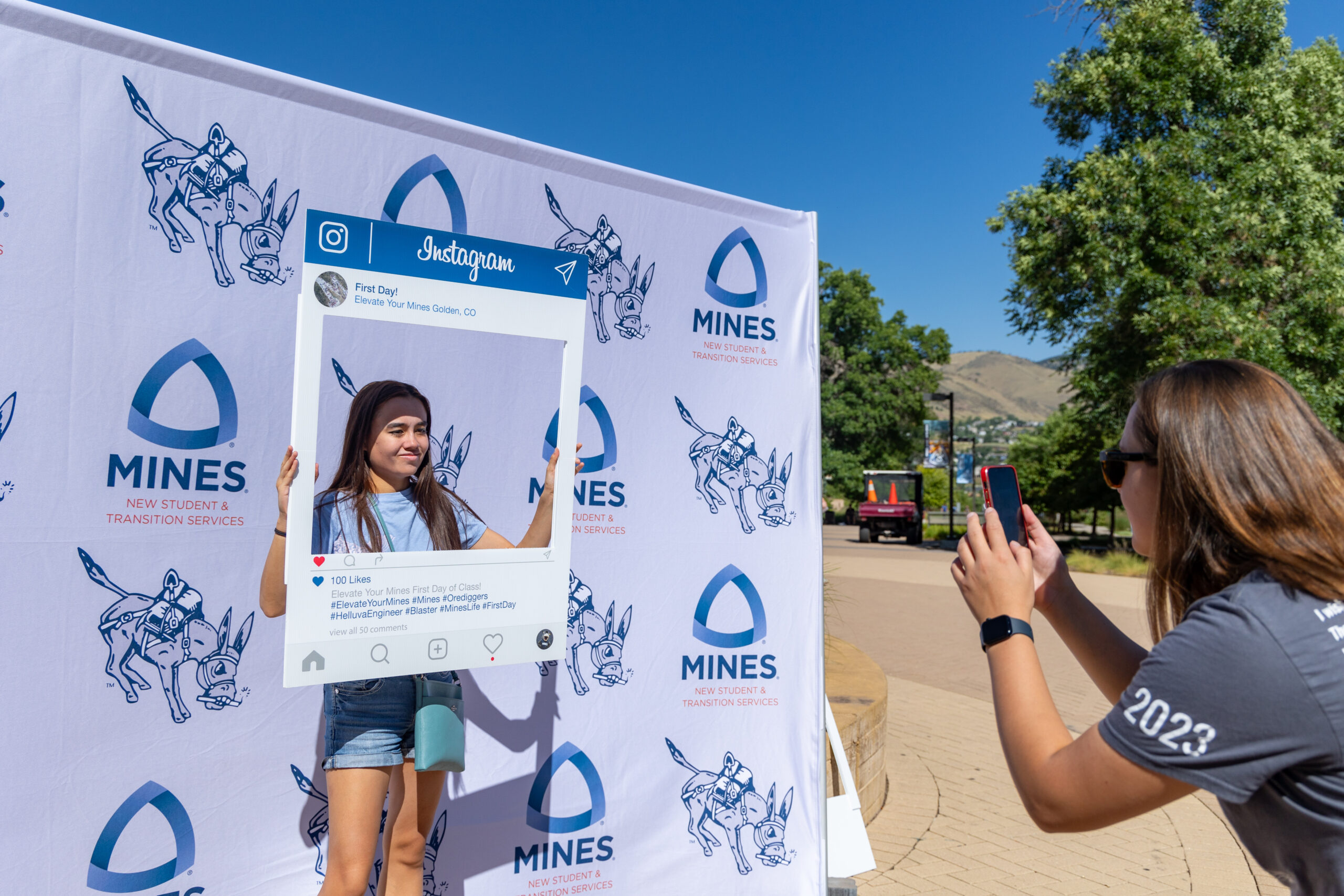 A student takes a photo on the first day of classes