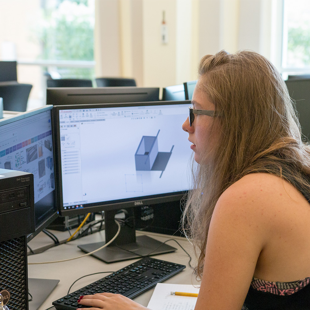 Student working on their design in the computer lab.