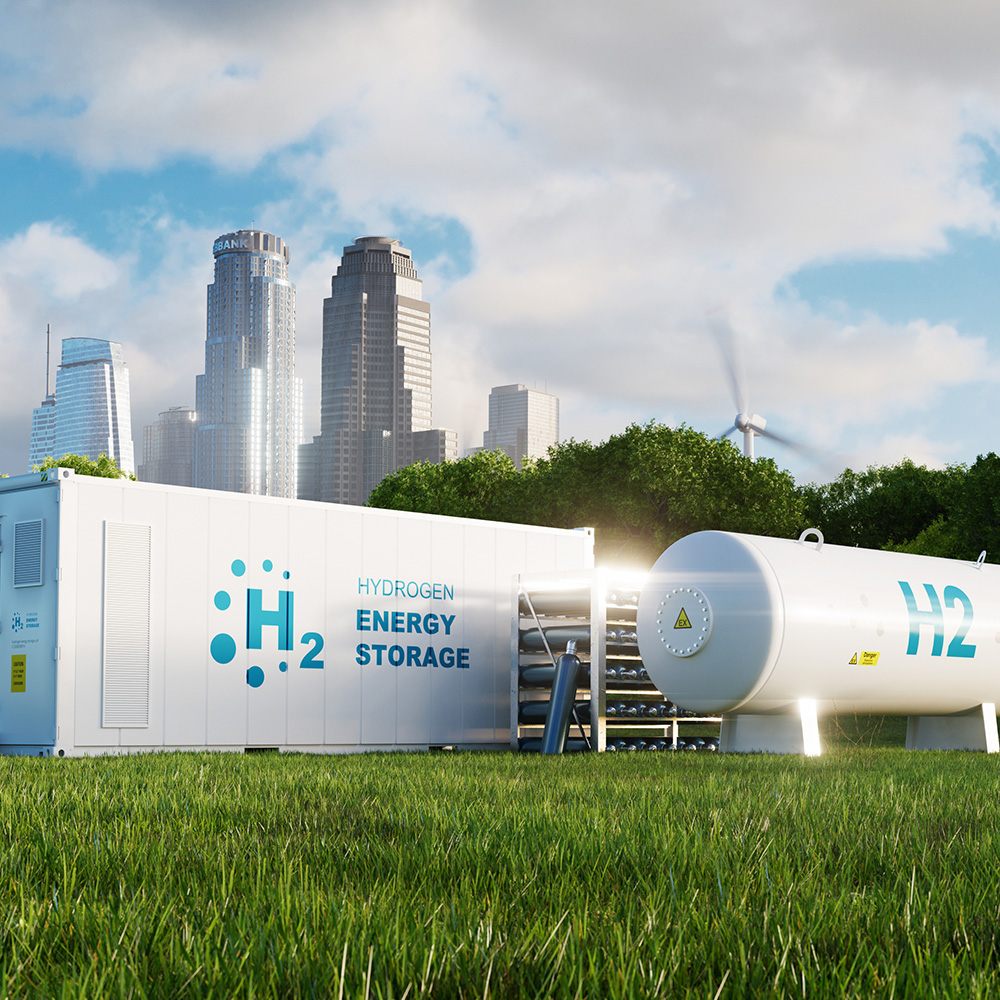 Concept of an energy storage system based on electrolysis of hydrogen in a clean environment with photovoltaics, wind farms and a city in the background. 