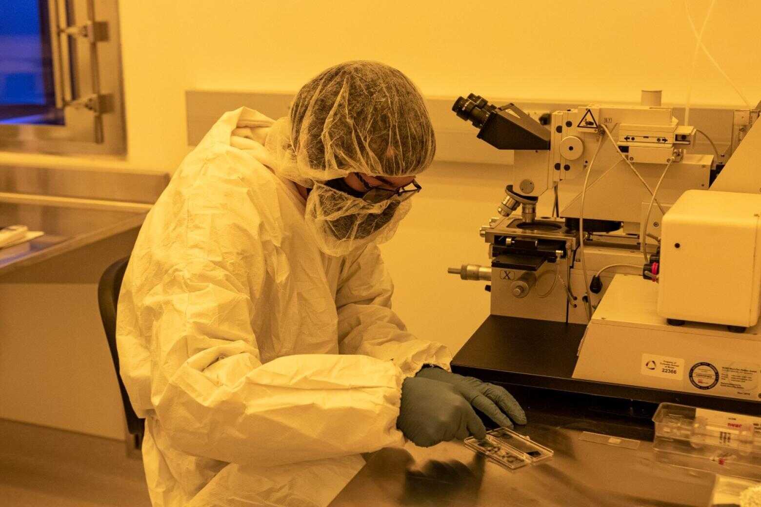 Researcher working in a quantum lab