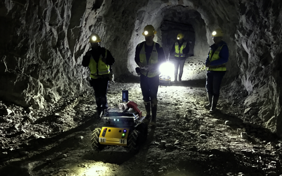 Students with robot in Edgar Mine