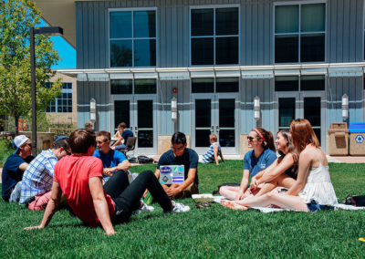 Students talking on lawn