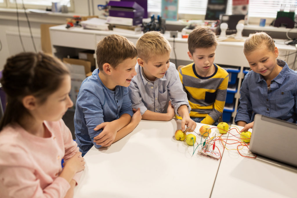 Group of children with robotics activity