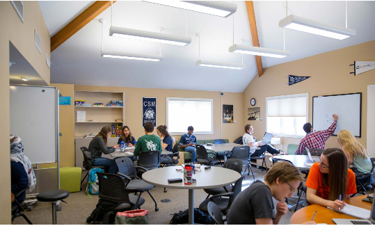 Students study in the open workspace in CASA.
