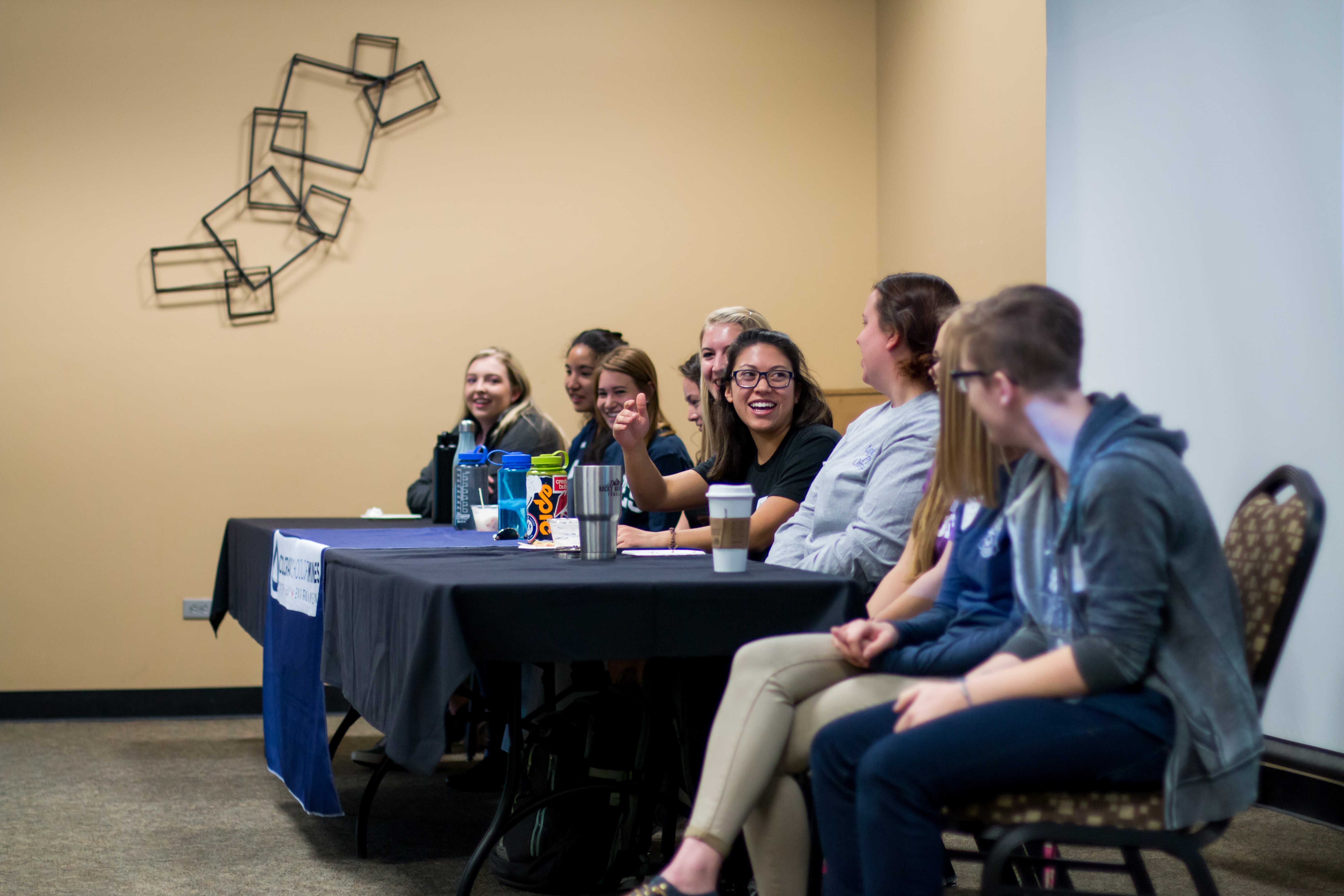 panelist of speakers talking amongst themselves