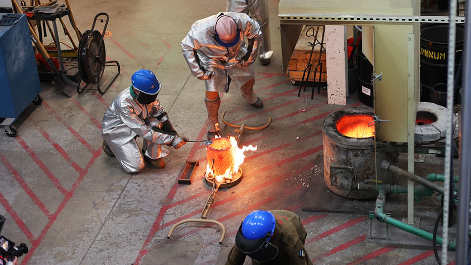 Metallurgical and Materials Engineering Individuals in the metallurgical and materials lab burning metal into tools